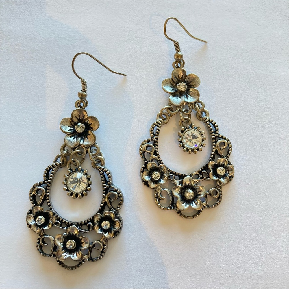 Floral silver tone dangle earrings